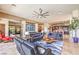 Expansive living area with stone floors, modern decor, and ample seating at 583 Saint Croix St, Henderson, NV 89012