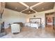 Spacious main bedroom with a ceiling fan, sitting area, and plenty of natural light at 583 Saint Croix St, Henderson, NV 89012