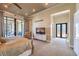 Spacious main bedroom with sitting area and doors leading to outdoor patio at 583 Saint Croix St, Henderson, NV 89012