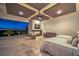 Inviting main bedroom with a fireplace, seating area, and a stunning view of the Las Vegas skyline at 583 Saint Croix St, Henderson, NV 89012