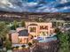 Elegant home featuring a private pool, outdoor patio, and stylish architecture blending seamlessly with the desert landscape at 583 Saint Croix St, Henderson, NV 89012