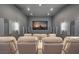 Home theater with comfortable seating, surround sound, and large screen at 583 Saint Croix St, Henderson, NV 89012