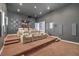 View of tiered seating and projector in home theater with movie storage at 583 Saint Croix St, Henderson, NV 89012