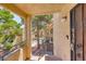 Cozy balcony area with views of lush greenery and building exterior, a charming outdoor retreat at 601 Cabrillo Cir # 536, Henderson, NV 89015