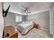 Cozy bedroom with neutral colors and a ceiling fan at 601 Cabrillo Cir # 536, Henderson, NV 89015