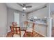 Cozy dining area with a glass table, seamlessly connected to the kitchen at 601 Cabrillo Cir # 536, Henderson, NV 89015