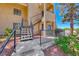 Exterior shot of building with private stairwell access, beautiful landscaping, and ample parking nearby at 601 Cabrillo Cir # 536, Henderson, NV 89015
