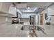 Renovated kitchen with stainless steel appliances and breakfast bar at 601 Cabrillo Cir # 536, Henderson, NV 89015