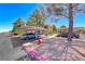 Parking area with covered parking spots and mature landscaping near the buildings at 601 Cabrillo Cir # 536, Henderson, NV 89015