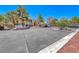 Spacious parking lot near residential buildings with well-maintained landscaping and trees at 601 Cabrillo Cir # 536, Henderson, NV 89015