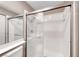 Modern bathroom with a glass-enclosed shower featuring chrome fixtures and tiled walls at 601 Cabrillo Cir # 536, Henderson, NV 89015