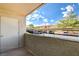 View of the parking and condo buildings as seen from a balcony with storage at 7300 Pirates Cove Rd # 1032, Las Vegas, NV 89145