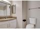Bathroom with granite counters, undermount sink, and a toilet at 7300 Pirates Cove Rd # 1032, Las Vegas, NV 89145