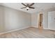 Bedroom featuring a ceiling fan and access to the bathroom at 7300 Pirates Cove Rd # 1032, Las Vegas, NV 89145