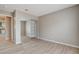 Neutral bedroom with wood-look floors and closet with mirror doors at 7300 Pirates Cove Rd # 1032, Las Vegas, NV 89145