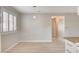 Dining area with modern light fixture and view of hallway at 7300 Pirates Cove Rd # 1032, Las Vegas, NV 89145