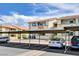 Community parking area with covered parking and nearby condo buildings on a sunny day at 7300 Pirates Cove Rd # 1032, Las Vegas, NV 89145