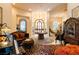 Elegant foyer with grand entrance, chandelier, and decorative details at 8120 W Red Coach Ave, Las Vegas, NV 89129