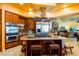 Spacious kitchen with stainless steel appliances and a center island perfect for cooking and gathering at 8120 W Red Coach Ave, Las Vegas, NV 89129