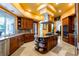 Gourmet kitchen with stainless steel appliances and custom cabinets offers style and functionality at 8120 W Red Coach Ave, Las Vegas, NV 89129