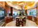 Open concept kitchen with a center island, stainless appliances and travertine floors at 8120 W Red Coach Ave, Las Vegas, NV 89129