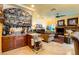 Comfortable living room with a wet bar, providing a relaxing and social gathering space at 8120 W Red Coach Ave, Las Vegas, NV 89129