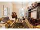Elegant living room featuring stylish furniture, decorative pieces, and ample natural light at 8120 W Red Coach Ave, Las Vegas, NV 89129