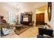 Elegant living room featuring stylish furniture, decorative pieces, and ample natural light at 8120 W Red Coach Ave, Las Vegas, NV 89129