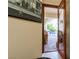 View through open doorway to outdoor patio with pool and covered seating area at 8120 W Red Coach Ave, Las Vegas, NV 89129