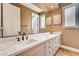 Bathroom features a double sink vanity with marble countertop and modern fixtures at 8224 Horseshoe Bend Ln, Las Vegas, NV 89113