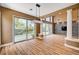 Bright dining room with wood floors and decorative lighting at 8224 Horseshoe Bend Ln, Las Vegas, NV 89113