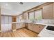Kitchen offers an island, updated countertops, and modern cabinets at 8224 Horseshoe Bend Ln, Las Vegas, NV 89113