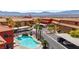 An aerial view of the community with pool, parking and desert landscaping at 890 Kitty Hawk Dr # 2412, Mesquite, NV 89027