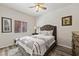 Cozy bedroom with modern decor, a comfortable bed, and ample natural light from the window at 890 Kitty Hawk Dr # 2412, Mesquite, NV 89027