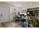 Bright dining area featuring modern decor, a bay window, and access to the kitchen at 890 Kitty Hawk Dr # 2412, Mesquite, NV 89027