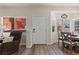 Open-concept dining area with views of neighborhood and a cozy armchair visible at 890 Kitty Hawk Dr # 2412, Mesquite, NV 89027