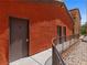A sidewalk leading to exterior unit doors with a desert landscape at 890 Kitty Hawk Dr # 2412, Mesquite, NV 89027