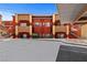An exterior view of the building with parking at 890 Kitty Hawk Dr # 2412, Mesquite, NV 89027