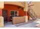 A welcoming front door and exterior with steps and desert landscaping at 890 Kitty Hawk Dr # 2412, Mesquite, NV 89027