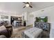 Spacious area with a cozy living room that transitions into a modern kitchen with bar stool seating at 890 Kitty Hawk Dr # 2412, Mesquite, NV 89027