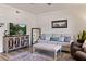 Cozy living room showcasing modern furniture, a large TV, and wood-style flooring at 890 Kitty Hawk Dr # 2412, Mesquite, NV 89027