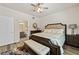 Comfortable bedroom featuring a king-size bed and a view of the connected bathroom at 890 Kitty Hawk Dr # 2412, Mesquite, NV 89027