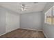 Simple bedroom featuring neutral walls, carpet flooring, and a closet with sliding doors at 9031 Jumping Jacks Ave, Las Vegas, NV 89178