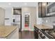 Well-equipped kitchen with stainless appliances and a walk-in pantry, perfect for culinary enthusiasts at 9031 Jumping Jacks Ave, Las Vegas, NV 89178