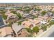 Established neighborhood with diverse home styles and desert landscaping, offering a welcoming community feel at 9047 Harbor Wind Ave, Las Vegas, NV 89178