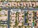 Bird's eye view of a residential neighborhood showing surrounding homes, yards, and street layout at 9047 Harbor Wind Ave at 9047 Harbor Wind Ave, Las Vegas, NV 89178