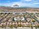 Aerial view of a neighborhood with Lone Mountain visible in the distance; located at 9047 Harbor Wind Ave at 9047 Harbor Wind Ave, Las Vegas, NV 89178