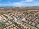 Wide aerial view of a residential neighborhood; the home is located at 9047 Harbor Wind Ave at 9047 Harbor Wind Ave, Las Vegas, NV 89178