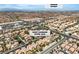 Aerial view of a neighborhood with the Vegas Strip visible in the distance; located at 9047 Harbor Wind Ave at 9047 Harbor Wind Ave, Las Vegas, NV 89178