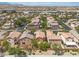 Picturesque neighborhood showcasing well-kept homes, desert landscaping, and community charm at 9047 Harbor Wind Ave, Las Vegas, NV 89178
